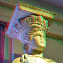 Blurry draft of a photogrammetrically created image, depicting a close up of the Karyatid's bust and the capital above her head as currently exhibited in an interior space.